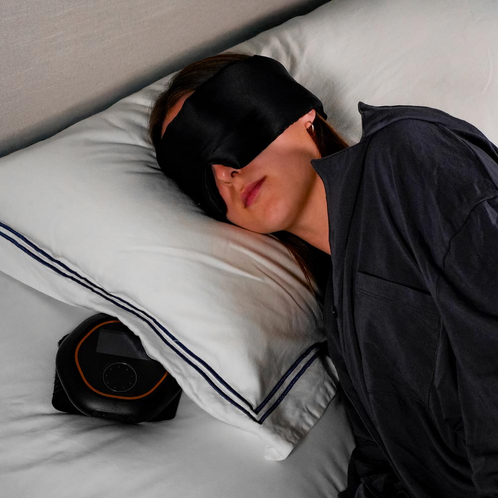 Women wearing eye mask with CELLER8 under pillow